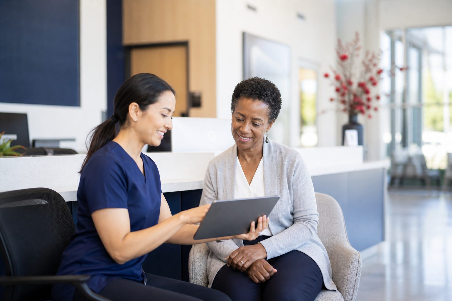 Patient access specialist explaining financial information