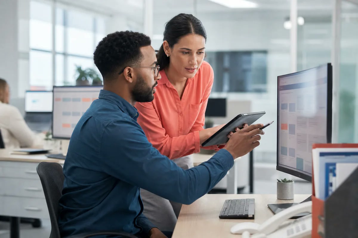 Medical billing specialists coordinating claim workflows